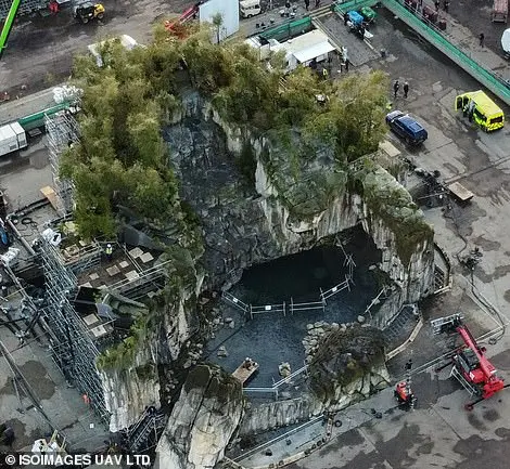Dramatic: A large pit had been built into the makeshift rock face with the floor painted a dark sleet grey to create a sense of foreboding when filming began on the completed set