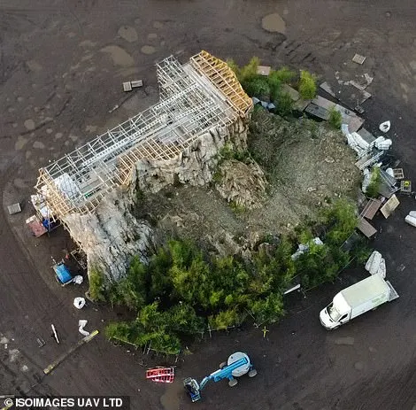 Vast: Several vehicles were parked around the Batcave set, showing how large it was