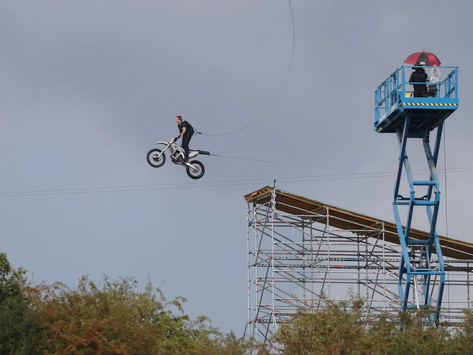 The Hollywood superstar was seen jumping off a ramp while riding a motorcycle