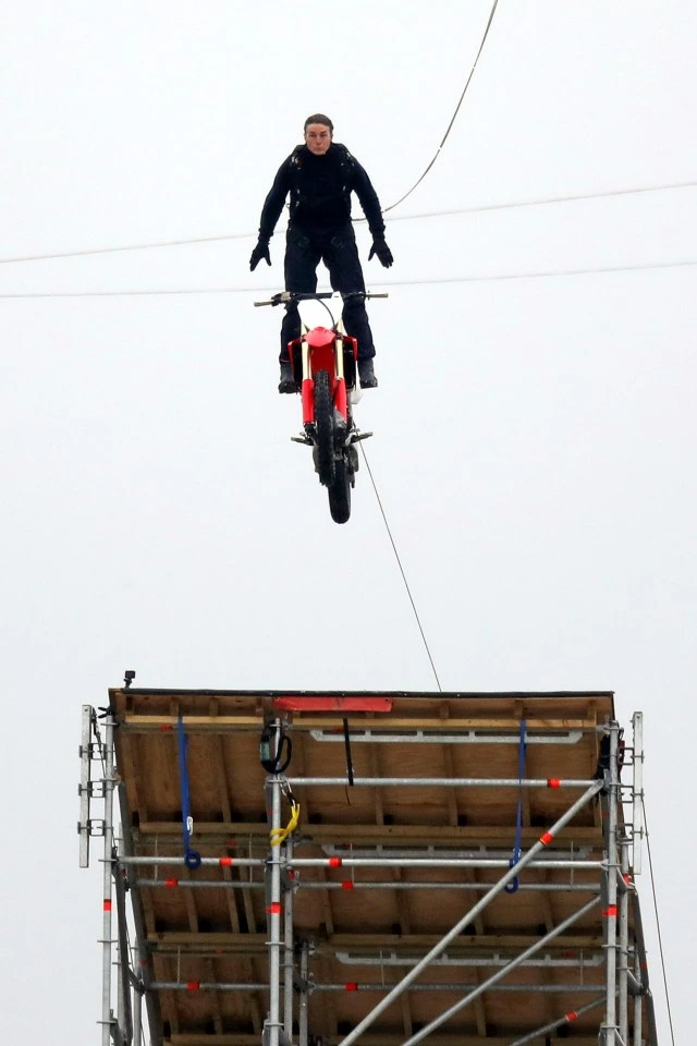 Tom, 58, takes flight in the incredibly dangerous stunt