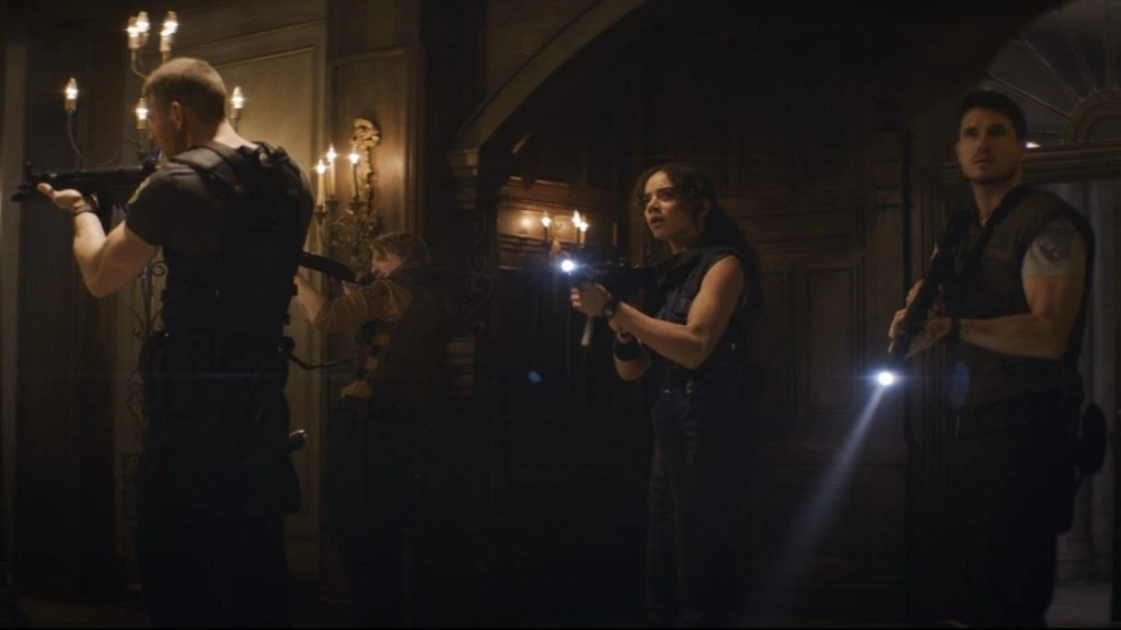 Albert Wesker (Tom Hopper), Richard Aiken (Chad Rook), Jill Valentine (Hannah John-Kamen), and Chris Redfield (Robbie Amell)